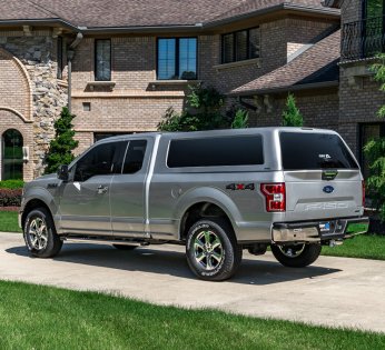 Truck with an A.R.E. truck bed cover installed